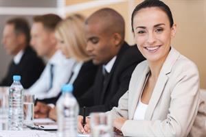 iStock_000047322118_XXXLarge smiling woman in meeting